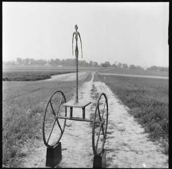 Giacometti's The Chariot 1950 photographed by Ernst Scheidegger in the Swiss countryside, 1963