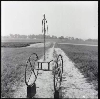 Giacometti's The Chariot 1950 photographed by Ernst Scheidegger in the Swiss countryside, 1963