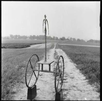 Giacometti's The Chariot 1950 photographed by Ernst Scheidegger in the Swiss countryside, 1963
