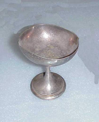 Silver goblet, one of the objects from Cornelia Parker's installation Cold Dark Matter: An Exploded View