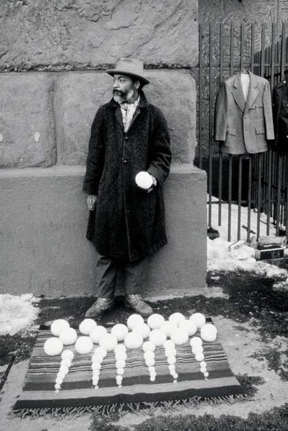 David Hammons performing Blizaard Ball Sale 1983 Cooper Square New York City
