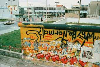 Lost Art: Keith Haring - section of Berlin Wall mural covered by graffiti