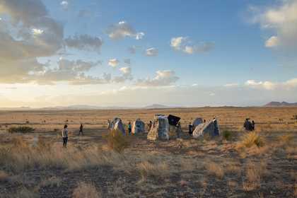 Haroon Mirza’s stone circle, 2018, black marble boulders with integrated LEDs and speakers that produce patterns of electronic sound and light from energy generated by solar panels, in the desert grasslands east of Marfa, Texas - photo Jennifer Boomer
