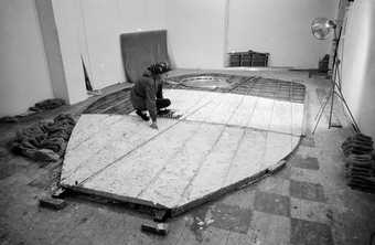 Barbara Hepworth working on the armature of Single Form in the Palais de Danse, St Ives