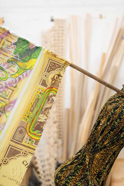 Interior shot showing details of fabrics in Hew Locke's studio
