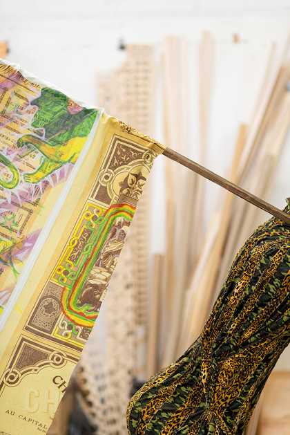 Interior shot showing details of fabrics in Hew Locke's studio