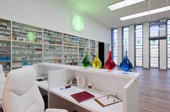 Installation view of Damien Hirst's Pharmacy at Tate Modern, 2012