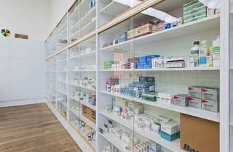 Installation view of Damien Hirst's Pharmacy at Tate Modern, 2012