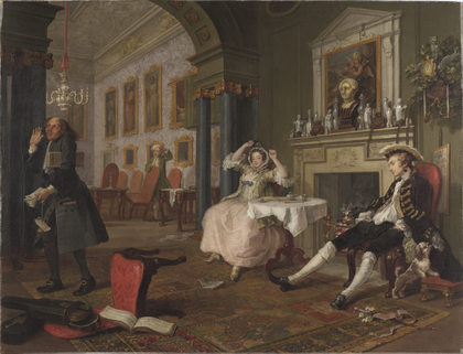 Two people sitting and one standing in disordered home.