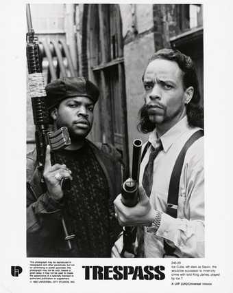 Ice Cube and Ice T in a promotional photo for the film Looters released as Trespass 1992 image of two male figures holding guns