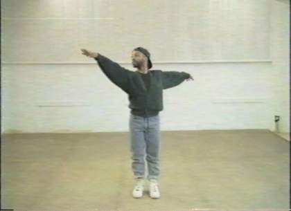 Picture of man with right hand stretched as if dancing