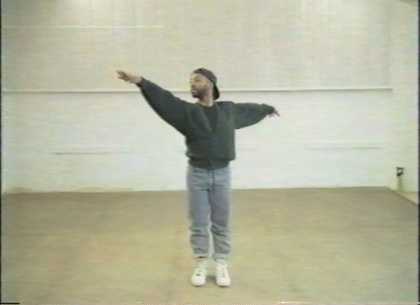 Picture of man with right hand stretched as if dancing