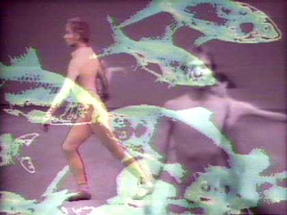 two men dancing and fish