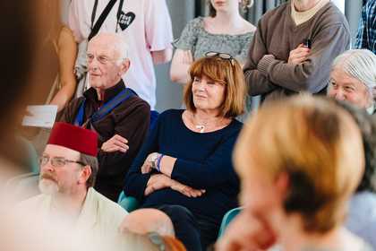 Visitors listening to a talk