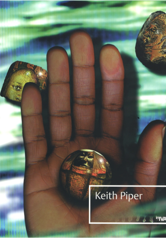 Book cover featuring a hand, palm-side up, holding a marble-like sphere that reflects handwritten text and a sculptural face. The background is a watery blue and green, with two more marble or pebble-like reflective objects. Text reads: Keith Piper, Iniva