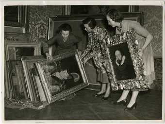 George Gower paintings being moved from the lower ground floor as flood precaution in February 1953