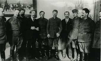 Fig.1 Stalin stands with a group of delegates at the Fourteenth Party Conference in April 1925.