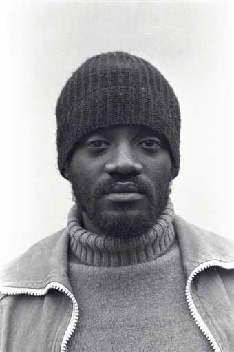 Darcus Howe in hat c. 1970 Copyright 2017 Neil Kenlock