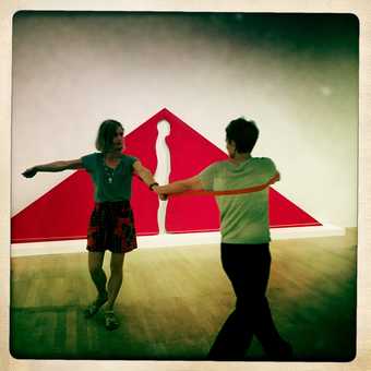 two people dancing in the gallery