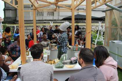 People sitting having food in the garden