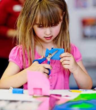 A child taking part in an art workshop at Tate Liverpool