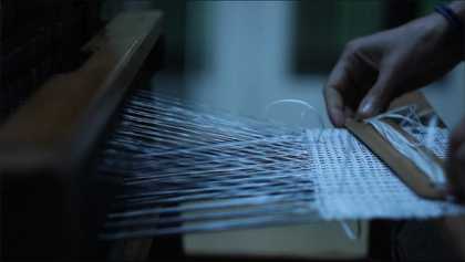 Ismini weaving on Anni Albers' loom