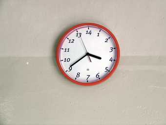 Jan Simon Six Day Week 2004 photograph of a wall clock from a performance 