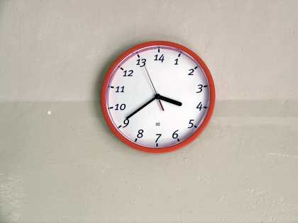 Jan Simon Six Day Week 2004 photograph of a wall clock from a performance