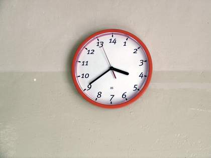 Jan Simon Six Day Week 2004 photograph of a wall clock from a performance