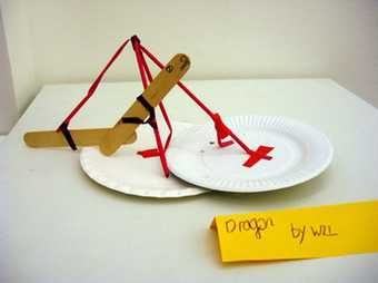 Kid's sculpture made from lolly sticks and a paper plate