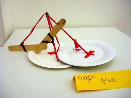 Kid's sculpture made from lolly sticks and a paper plate