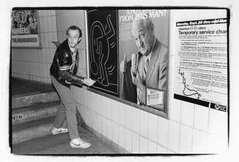 Keith Haring drawing on a subway platform, New York City, c.1982