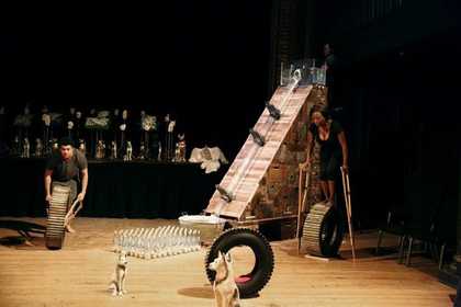Photograph of 2 performers interacting with installation of sculptures by Kemang Wa Lehulere courtesy of the artist and Marian Goodman Gallery