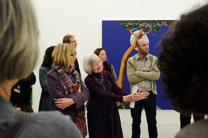 Late at Tate St Ives, group standing in the gallery with a guide explaining work