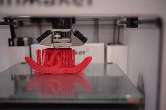 3D printer printing a design