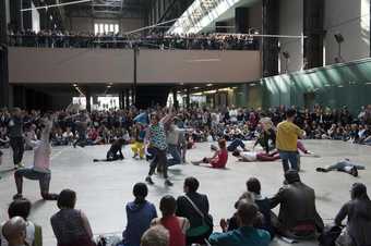 Close up of dancers in the turbine hall