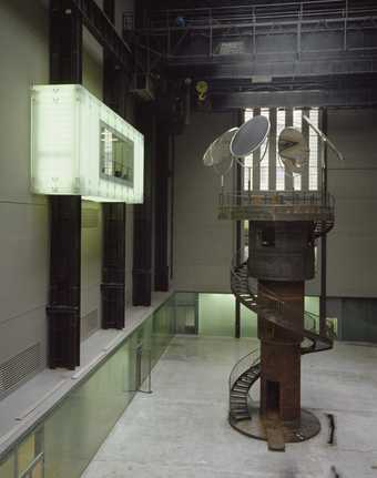 Tower-like metal sculpture in turbine hall