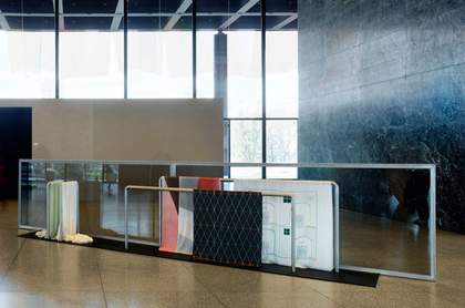 Goshka Macuga Haus der Frau 2 2007 rectangular steel structures with fabrics draped over them with 