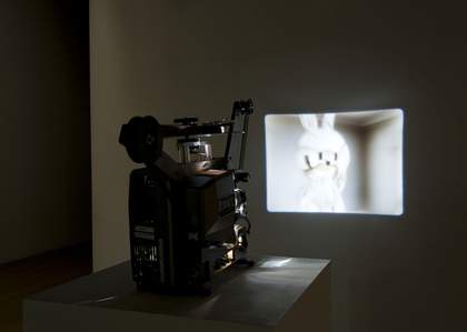 Installation view of Turner Prize 2008 featuring Mark Leckey Made in Eaven image of rabbit like toy being projected on to a wall