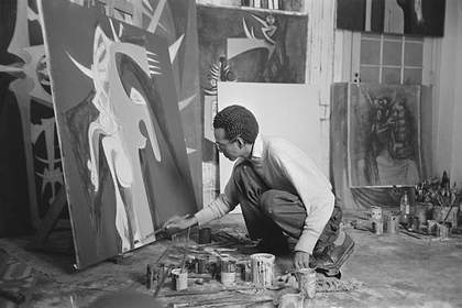 Photograph of Wifredo Lam in his studio in Havana in 1950