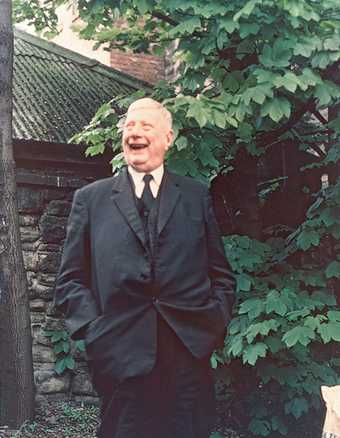 L S Lowry in the garden at his house in Mottram-in-Longdendale