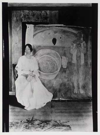 Mary Hutchinson with Vanessa Bell's painting, The Tub, [1916] © Tate Archive