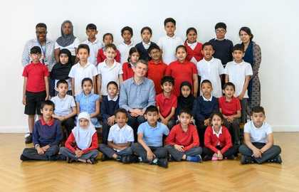 A class photograph of year three children