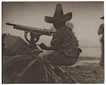 Rebel machine gunner, second Battle of Torreon, Mexican Revolution, April 1914