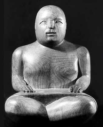 Ronald Moody Seated Sarong Figure 1938 beech, 27 x 18 x 14 cm 