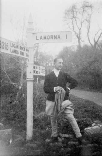 Marlow Moss in front of Lamorna sign