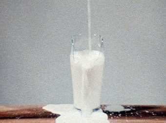 David Lamelas film still milk pouring into a glass