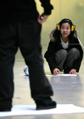 Teenagers doing the Making your Mark activity at Tate Modern