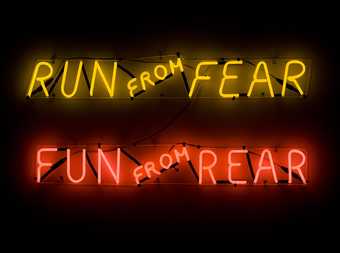 Neon sign reading 'Run from Fear', 'Fun from Rear'