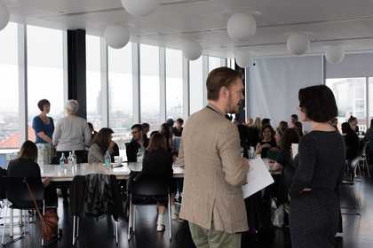 Two people in discussion at the New Materialism Training School, 2016